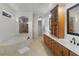 Spa-like bathroom with soaking tub and double vanity at 1869 Merlot Dr, Sanford, FL 32771