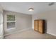 Bedroom with carpet, window, and built-in wardrobe at 1869 Merlot Dr, Sanford, FL 32771
