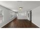 Bright bonus room with hardwood floors and home theater access at 1869 Merlot Dr, Sanford, FL 32771