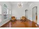 Bright dining area with hardwood floors and modern chairs at 1869 Merlot Dr, Sanford, FL 32771
