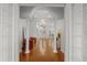 Elegant entryway with hardwood floors and columns at 1869 Merlot Dr, Sanford, FL 32771