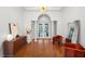 Stylish entryway, hardwood floors, and modern decor at 1869 Merlot Dr, Sanford, FL 32771