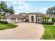 Beautiful home with three-car garage and paver driveway at 1869 Merlot Dr, Sanford, FL 32771