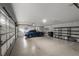 Attached garage with storage shelving and space for one car at 1869 Merlot Dr, Sanford, FL 32771
