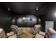Home theater with large screen and comfortable seating at 1869 Merlot Dr, Sanford, FL 32771