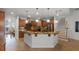 Large kitchen with island, stainless steel appliances, and granite countertops at 1869 Merlot Dr, Sanford, FL 32771