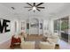 Relaxing living room, pool access, and flat screen TV at 1869 Merlot Dr, Sanford, FL 32771