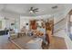 Open concept living room with kitchen and staircase views at 1869 Merlot Dr, Sanford, FL 32771