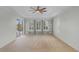 Bright bedroom with built-in shelves and pool view at 1869 Merlot Dr, Sanford, FL 32771