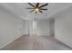 Spacious main bedroom with carpet and ceiling fan at 1869 Merlot Dr, Sanford, FL 32771