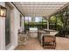 Outdoor kitchen with granite countertops and built-in grill at 1869 Merlot Dr, Sanford, FL 32771