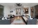 Covered patio with comfortable seating and view of kitchen at 1869 Merlot Dr, Sanford, FL 32771