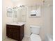 Bathroom with tub, toilet, and vanity at 2101 Cascades Blvd # 206, Kissimmee, FL 34741