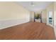 Large living room featuring wood floors and a view at 2101 Cascades Blvd # 206, Kissimmee, FL 34741