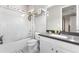 Bathroom with shower/tub combo, toilet, and vanity with gray countertop at 6920 Phillips Reserve Ct, Orlando, FL 32819