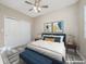 Main bedroom with a blue bed and yellow throw pillows at 727 N Grandview Ave, Daytona Beach, FL 32118
