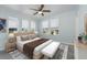 Bright bedroom with a plush bed, ample natural light, and stylish decor at 727 N Grandview Ave, Daytona Beach, FL 32118