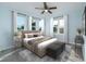 Large bedroom featuring a neutral color palette and comfortable seating at 727 N Grandview Ave, Daytona Beach, FL 32118