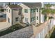 Rear view of two story home with spiral staircase at 727 N Grandview Ave, Daytona Beach, FL 32118