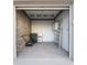 Organized garage with storage cabinets and flooring at 727 N Grandview Ave, Daytona Beach, FL 32118