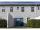 Private backyard with a sliding glass door and a white fence at 1166 Presidential Ln, Apopka, FL 32703