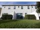 Private backyard with sliding glass door access and a fenced area at 1166 Presidential Ln, Apopka, FL 32703