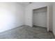 Bright bedroom featuring gray carpeting and a spacious closet at 1166 Presidential Ln, Apopka, FL 32703