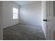 Cozy bedroom with gray carpet and ample closet space at 1166 Presidential Ln, Apopka, FL 32703