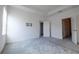 Spacious bedroom with gray carpet, a closet, and access to bathroom at 1166 Presidential Ln, Apopka, FL 32703