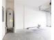 Unfinished garage with white block walls and concrete floor at 1166 Presidential Ln, Apopka, FL 32703