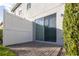 Brick paved patio adjacent to a white fence and sliding glass door at 1166 Presidential Ln, Apopka, FL 32703