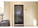 Dark brown front door with a building number at 1341 Arbor Vista Loop # 213, Lake Mary, FL 32746