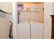 Well-equipped laundry room with washer and dryer at 1341 Arbor Vista Loop # 213, Lake Mary, FL 32746