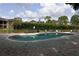 Freeform community pool with surrounding patio and chairs at 1341 Arbor Vista Loop # 213, Lake Mary, FL 32746