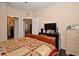 Comfortable bedroom with a queen-size bed and built-in dresser at 1341 Arbor Vista Loop # 213, Lake Mary, FL 32746