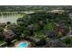 Community overview showcasing buildings, pool, and lake at 1341 Arbor Vista Loop # 213, Lake Mary, FL 32746