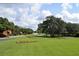 Community entrance with lush green lawns at 1341 Arbor Vista Loop # 213, Lake Mary, FL 32746