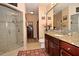 Elegant bathroom with granite countertop, walk-in shower, and modern fixtures at 1341 Arbor Vista Loop # 213, Lake Mary, FL 32746