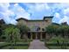 Stunning building exterior with landscaping and brick pathway at 1341 Arbor Vista Loop # 213, Lake Mary, FL 32746