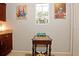 Kitchen corner with chess table and artwork at 1341 Arbor Vista Loop # 213, Lake Mary, FL 32746