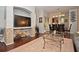 Living room with dark hardwood floors, a gray couch, and a glass-top coffee table at 1341 Arbor Vista Loop # 213, Lake Mary, FL 32746