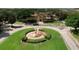Community entrance with fountain and lush landscaping at 1341 Arbor Vista Loop # 213, Lake Mary, FL 32746