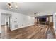 Bright living room with wood floors and fireplace at 16007 Horizon Ct, Clermont, FL 34711