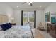 Main bedroom with king bed and plenty of natural light at 2479 Pine Preserve Ct, Saint Cloud, FL 34771