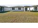 Spacious backyard with covered patio at 28054 Poppy Ct, Leesburg, FL 34748