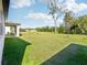 Spacious backyard with large grassy area at 28054 Poppy Ct, Leesburg, FL 34748