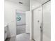 Clean bathroom with shower and access to bedroom at 28054 Poppy Ct, Leesburg, FL 34748
