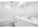 Modern bathroom with double vanity and a bathtub at 28054 Poppy Ct, Leesburg, FL 34748