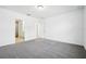 Spacious bedroom with carpet flooring and ample closet space at 28054 Poppy Ct, Leesburg, FL 34748