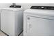 Bright laundry room with washer and dryer included at 28054 Poppy Ct, Leesburg, FL 34748